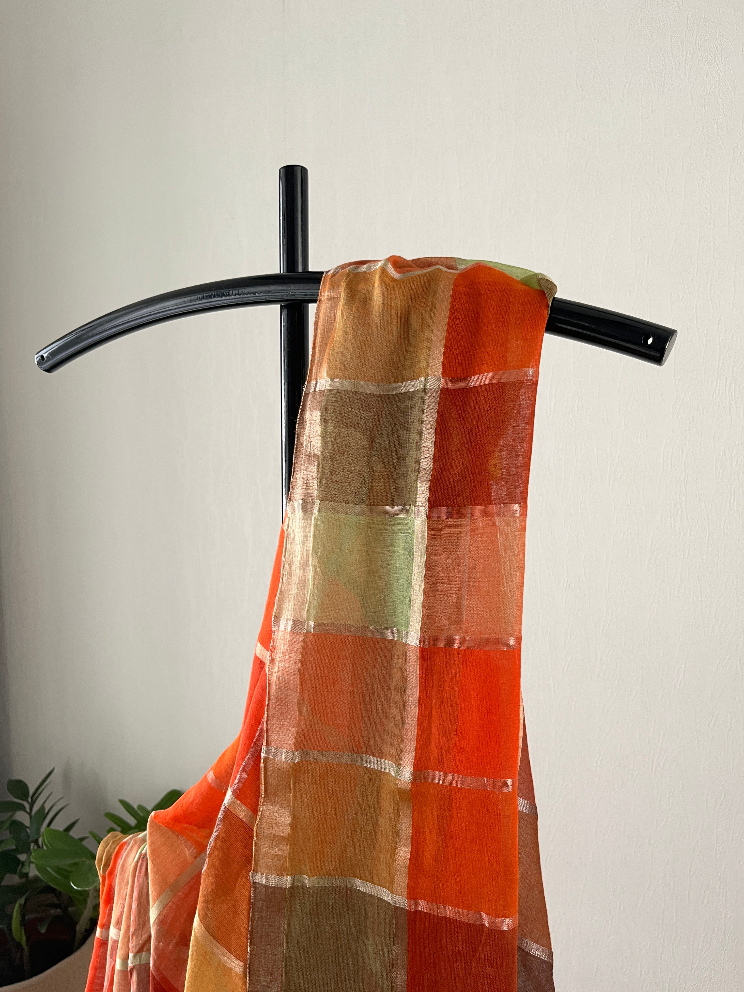 Sm-028 madras check mul cotton in the shades of orange and green