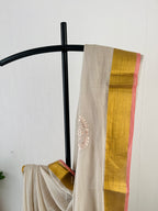 So-058 pearl grey silver embroidered body with golden zari and pink selvedge