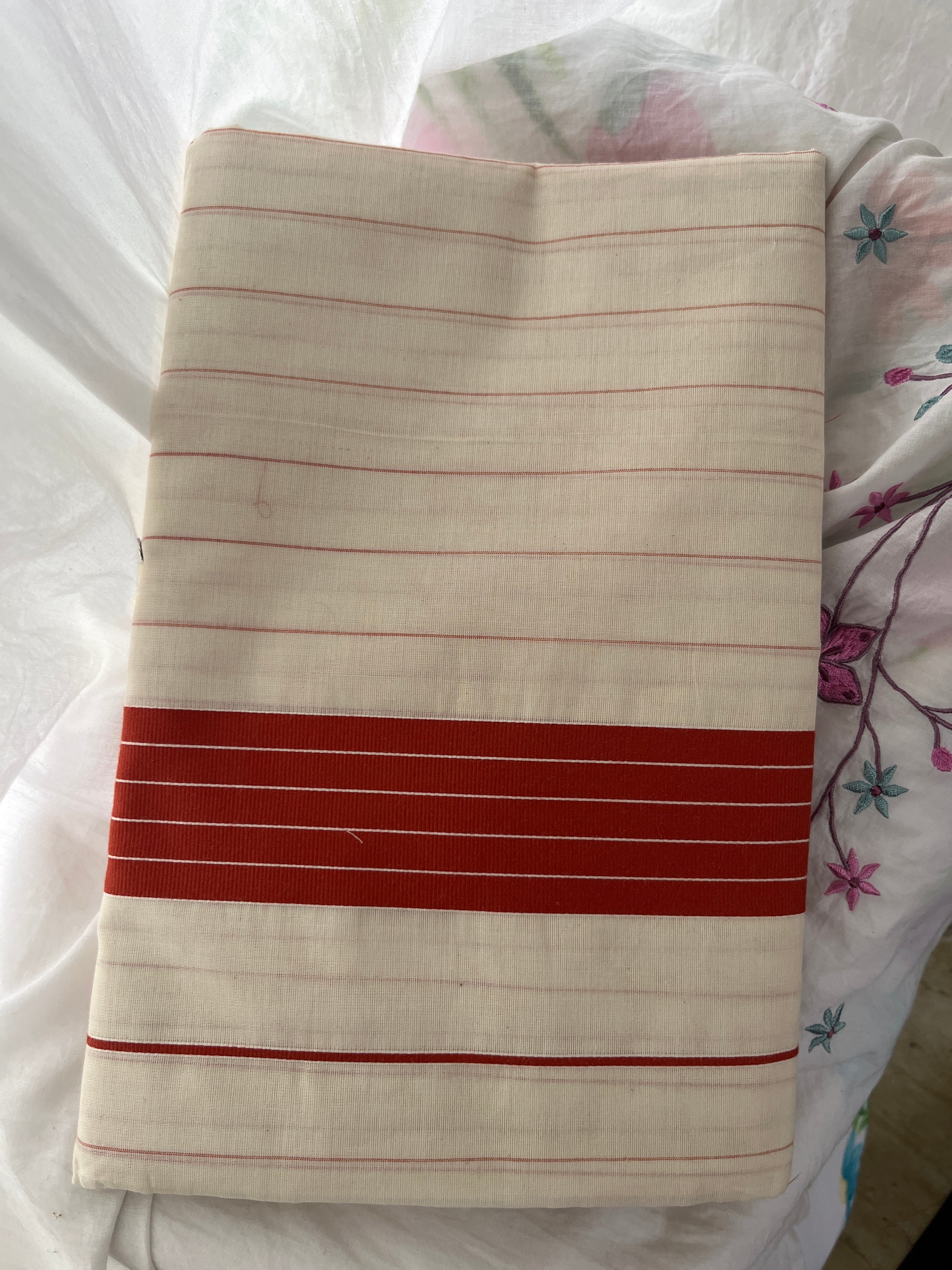 So-085 rust orange temple border Kerala saree