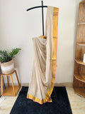 So-058 pearl grey silver embroidered body with golden zari and pink selvedge