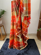 Sm-028 madras check mul cotton in the shades of orange and green